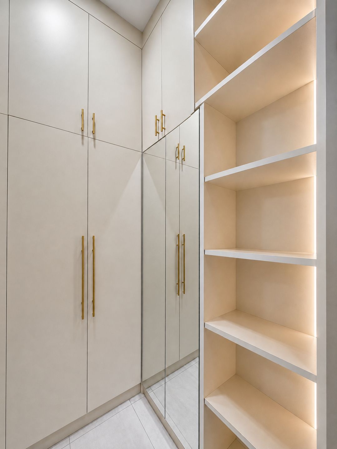 Built-in wardrobe with LED-lit display shelves, Pramu Jaya