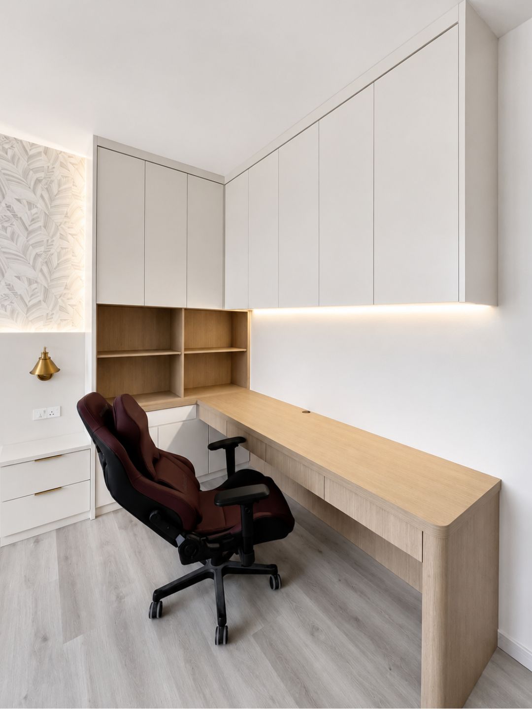 Home study with L-shaped desk and overhead cabinets