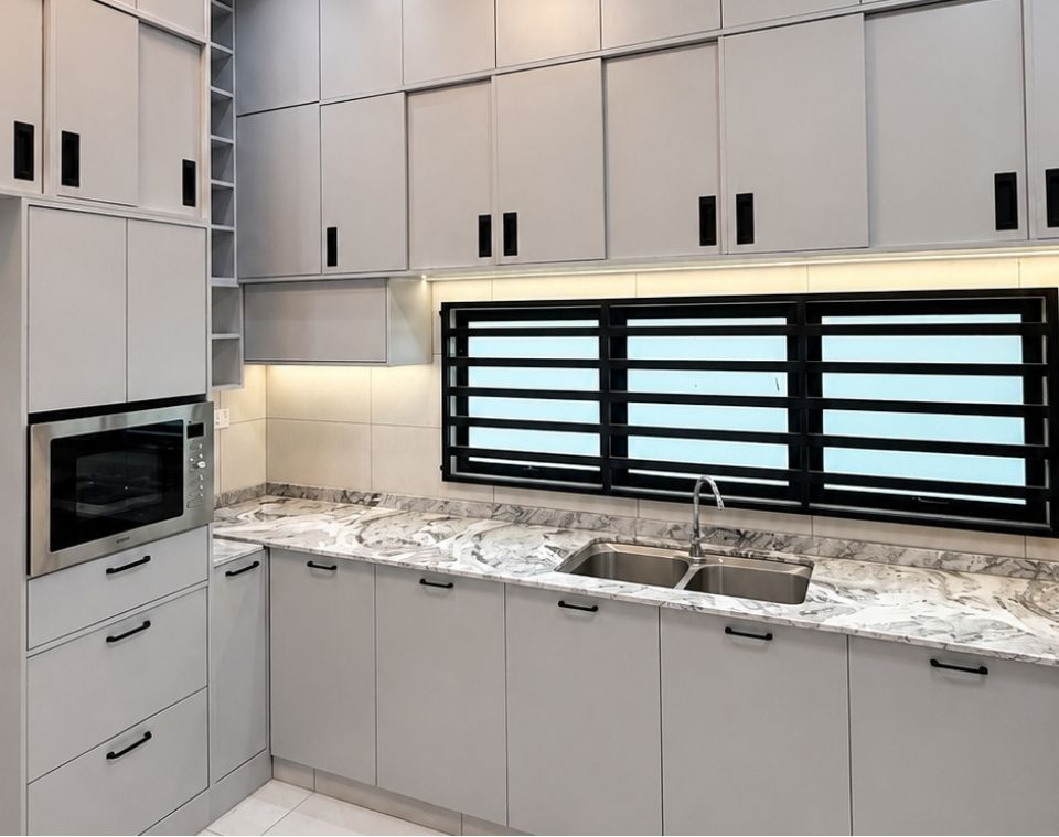 Sink-side run with marble-look countertop, integrated stainless-steel double bowl, and warm LED strip lighting under the upper cabinets